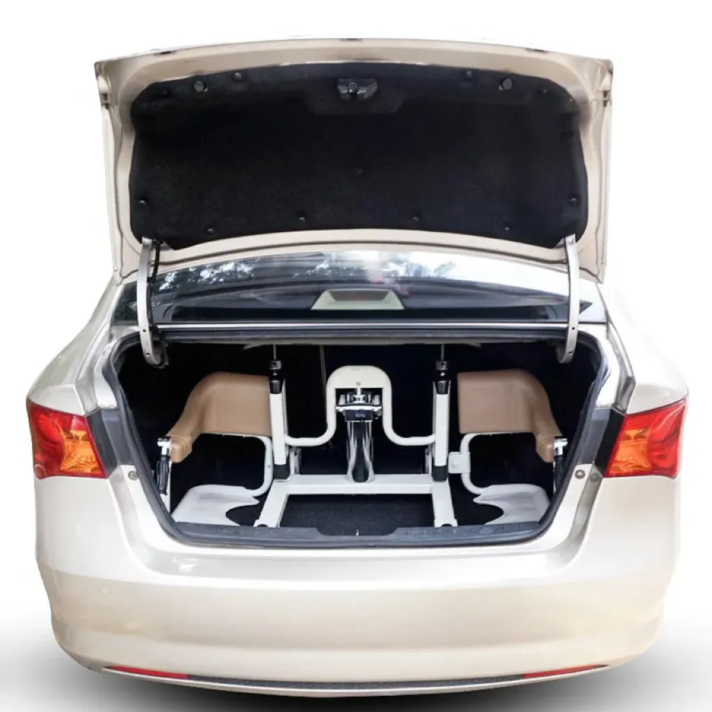 Krzeslo transferowe hydrauliczne Acti w bagażniku samochodu